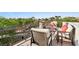Inviting rooftop deck with comfortable seating and scenic views, perfect for relaxation and entertaining at 2964 Via Della Amore, Henderson, NV 89052