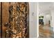 Ornate door leading into the home's wine cellar at 2964 Via Della Amore, Henderson, NV 89052