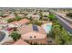 Aerial shot of a home with a pool, solar panels, and a serene neighborhood setting at 3200 Ridgecliff St, Las Vegas, NV 89129