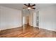 This bedroom boasts laminate flooring and doorways to a closet, another room, and an adjacent bathroom at 3200 Ridgecliff St, Las Vegas, NV 89129