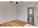 Bedroom features hardwood floors and a door leading to the hallway at 3200 Ridgecliff St, Las Vegas, NV 89129