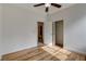 Bedroom showcasing hardwood floors and view into the ensuite bathroom at 3200 Ridgecliff St, Las Vegas, NV 89129