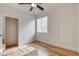 Comfortable bedroom with hardwood floors, closet, and natural light at 3200 Ridgecliff St, Las Vegas, NV 89129