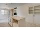 Dining area with tile floors, and adjacent stone fireplace at 3200 Ridgecliff St, Las Vegas, NV 89129
