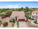 Well-maintained home featuring a tile roof, desert landscaping, and a two-car garage at 3200 Ridgecliff St, Las Vegas, NV 89129