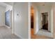 Hallway leads to a well-lit bathroom featuring stylish tile and a shower at 3200 Ridgecliff St, Las Vegas, NV 89129