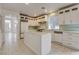 Open kitchen featuring stainless appliances, island, and tile backsplash at 3200 Ridgecliff St, Las Vegas, NV 89129