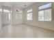 Open living area with tile floors and plenty of natural light at 3200 Ridgecliff St, Las Vegas, NV 89129