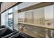 Stunning city view through perforated blinds, highlighting modern architecture and distant mountains at 3722 Las Vegas Blvd # 2509, Las Vegas, NV 89158