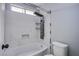 Modern bathroom featuring a shower and tub with a sleek, multifunction shower panel at 3953 Broad Meadow Ct, Las Vegas, NV 89129