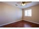 Bedroom featuring hardwood floors, ceiling fan and bright natural light at 3953 Broad Meadow Ct, Las Vegas, NV 89129