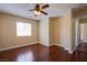 Cozy bedroom with hardwood floors, ceiling fan and bright natural light at 3953 Broad Meadow Ct, Las Vegas, NV 89129