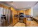 A well-equipped kitchen featuring stainless steel appliances and light wood cabinetry at 3953 Broad Meadow Ct, Las Vegas, NV 89129