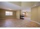 Spacious living area with tile flooring and a modern fireplace at 3953 Broad Meadow Ct, Las Vegas, NV 89129