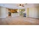 Open concept floor plan connecting the kitchen, living, and dining areas at 3953 Broad Meadow Ct, Las Vegas, NV 89129
