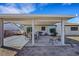 Inviting backyard patio with covered seating area and outdoor grill at 423 Golden Valley Dr, Henderson, NV 89002