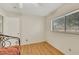 Bedroom features hardwood floors and a window with natural light at 423 Golden Valley Dr, Henderson, NV 89002