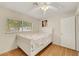 A serene bedroom featuring hardwood floors, natural light, and a peaceful ambiance at 423 Golden Valley Dr, Henderson, NV 89002