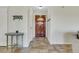 Charming foyer featuring a decorative front door and tiled flooring at 423 Golden Valley Dr, Henderson, NV 89002