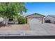 Charming single-story home featuring a two-car garage and low maintenance desert landscaping at 423 Golden Valley Dr, Henderson, NV 89002