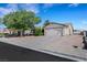Charming single-story home featuring a two-car garage and low maintenance desert landscaping at 423 Golden Valley Dr, Henderson, NV 89002