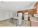 A modern kitchen with an island, stainless steel appliances, and plenty of cabinet storage at 423 Golden Valley Dr, Henderson, NV 89002