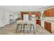 A spacious kitchen featuring an island with seating, stainless steel appliances, and ample counter space at 423 Golden Valley Dr, Henderson, NV 89002