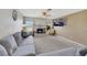Spacious living room with fireplace, ceiling fan, and large windows that provide lots of light at 423 Golden Valley Dr, Henderson, NV 89002
