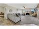 Spacious living room with fireplace, ceiling fan, and large windows that provide lots of light at 423 Golden Valley Dr, Henderson, NV 89002