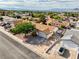 Charming single-Gathering house featuring a spacious driveway and a well-manicured front yard in a residential area at 423 Golden Valley Dr, Henderson, NV 89002