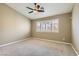 Bright bedroom with neutral walls, carpet flooring, a ceiling fan and natural light from a window at 423 Red Canvas Pl, Las Vegas, NV 89144
