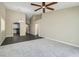 Open living space with modern flooring, high ceilings, neutral paint, and view into the kitchen at 423 Red Canvas Pl, Las Vegas, NV 89144