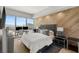 Bright bedroom with scenic city views features a comfortable bed, modern furniture, and a spacious layout at 4471 Dean Martin Dr # 1210, Las Vegas, NV 89103
