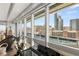 Featuring city views, the windows bring natural light to the living area and exercise space at 4471 Dean Martin Dr # 1210, Las Vegas, NV 89103