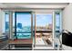 Expansive city views from a bright and modern office space featuring large windows and dual work stations at 4471 Dean Martin Dr # 1210, Las Vegas, NV 89103