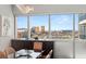 Dining area featuring a modern table, seating and views of the city at 4471 Dean Martin Dr # 1210, Las Vegas, NV 89103