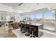 Modern kitchen with island, stainless steel appliances, bar stool seating and expansive city views at 4471 Dean Martin Dr # 1210, Las Vegas, NV 89103