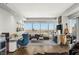 Bright living room features floor-to-ceiling windows offering great views, hardwood floors, and modern decor at 4471 Dean Martin Dr # 1210, Las Vegas, NV 89103