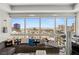 Living room featuring floor-to-ceiling windows offering scenic views of the city at 4471 Dean Martin Dr # 1210, Las Vegas, NV 89103