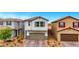 This home features a paver driveway and low water landscaping at 5016 Kaslo Ave, Las Vegas, NV 89139