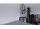 Close up detail of garage components including tankless water heater and water filter at 5016 Kaslo Ave, Las Vegas, NV 89139