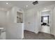 Hallway with views of a laundry room and bedroom at 5016 Kaslo Ave, Las Vegas, NV 89139