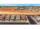 New homes with garages, desert landscaping and mountain views in a developing community at 5016 Kaslo Ave, Las Vegas, NV 89139