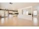 Open-concept living area showcasing seamless flow between living, dining, and kitchen spaces at 5044 Signal Dr, Las Vegas, NV 89130