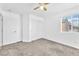 Bedroom with carpet, closet, and window at 5060 Blue Rose St, North Las Vegas, NV 89081