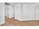 Open hallway features hardwood floors and doorways, perfect for welcoming guests at 5060 Blue Rose St, North Las Vegas, NV 89081