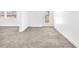 Spacious living room with carpet flooring at 5060 Blue Rose St, North Las Vegas, NV 89081