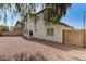 Spacious backyard, featuring low-maintenance landscaping and block wall fencing at 5216 Aztec Heights St, North Las Vegas, NV 89081
