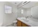 Well-lit bathroom featuring a stylish vanity with modern fixtures and a large mirror at 5216 Aztec Heights St, North Las Vegas, NV 89081
