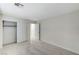Spacious bedroom showcasing neutral carpeting, closet space, and a bright, airy feel at 5216 Aztec Heights St, North Las Vegas, NV 89081